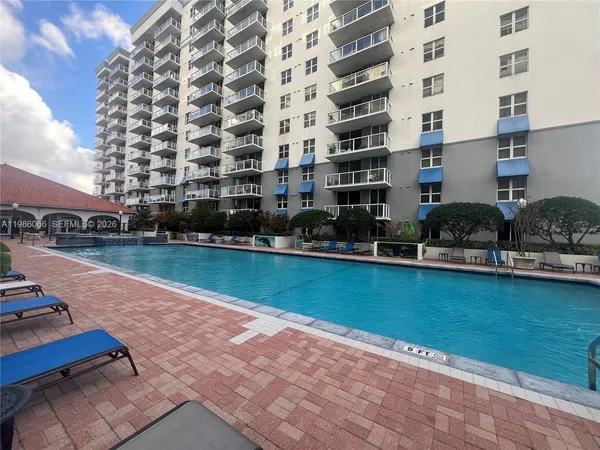 a view of a swimming pool and outdoor space