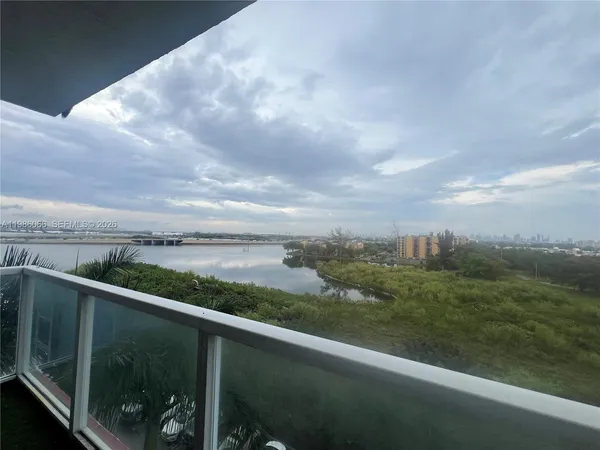 a view of outdoor space and river