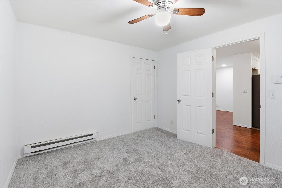 4404 Southeast 3rd Place Renton, WA 98059 - Photo 13 of 27 wooden floor in an empty room
