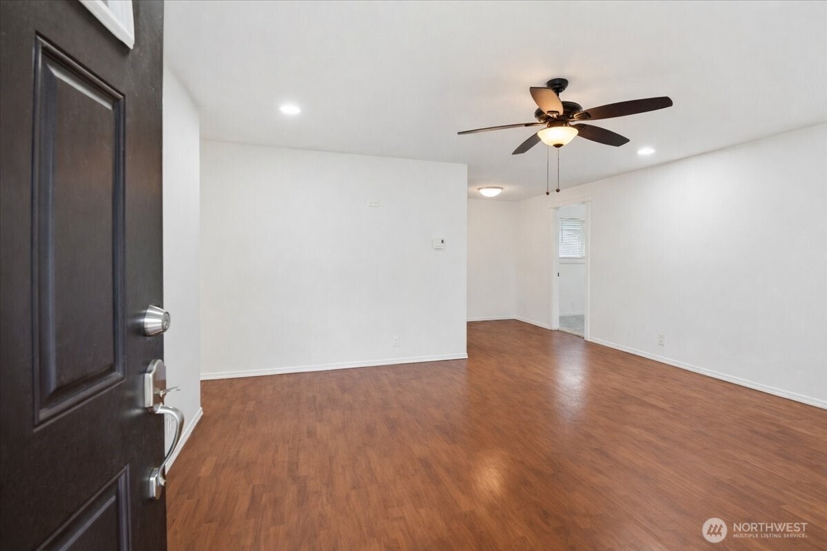 4404 Southeast 3rd Place Renton, WA 98059 - Photo 2 of 27 wooden floor in an empty room