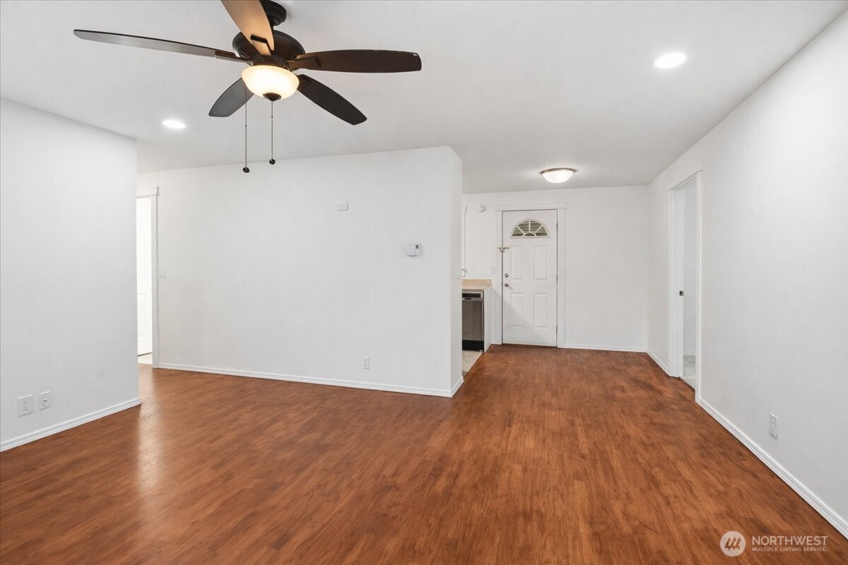 4404 Southeast 3rd Place Renton, WA 98059 - Photo 7 of 27 a view of empty room with wooden floor
