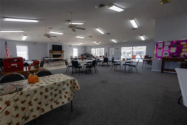 a living room with lots of furniture and a flat screen tv