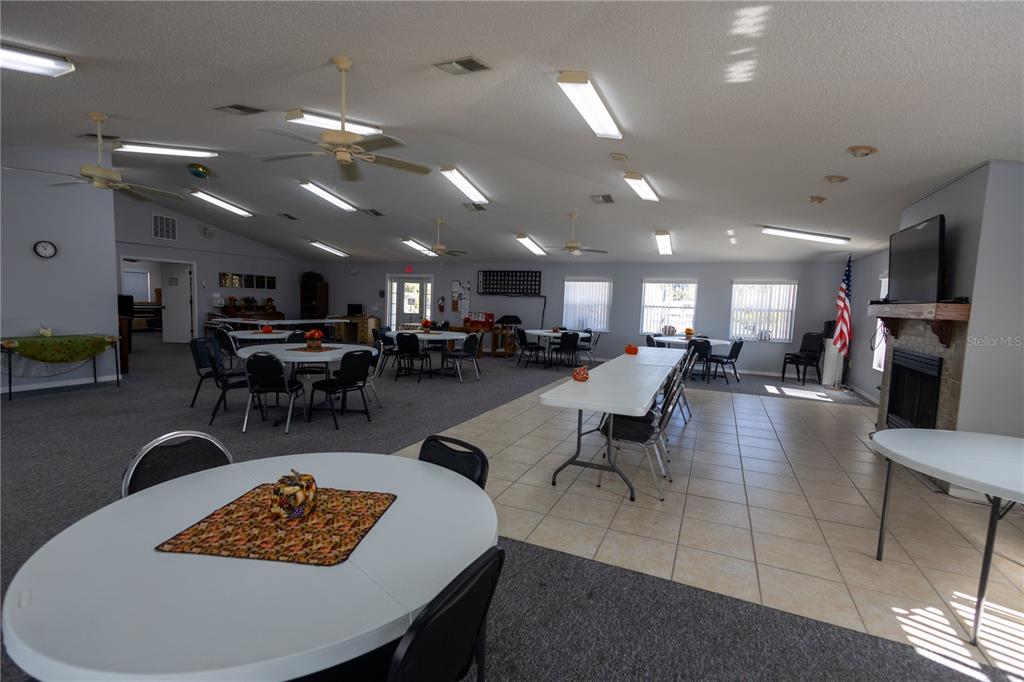 0 Forest Glenn Drive Spring Hill, FL 34607 - Photo 14 of 31 a living room with furniture and kitchen view