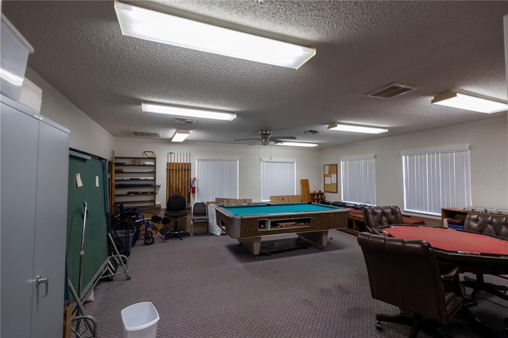 0 Forest Glenn Drive Spring Hill, FL 34607 - Photo 21 of 31 a room with furniture and gym equipment