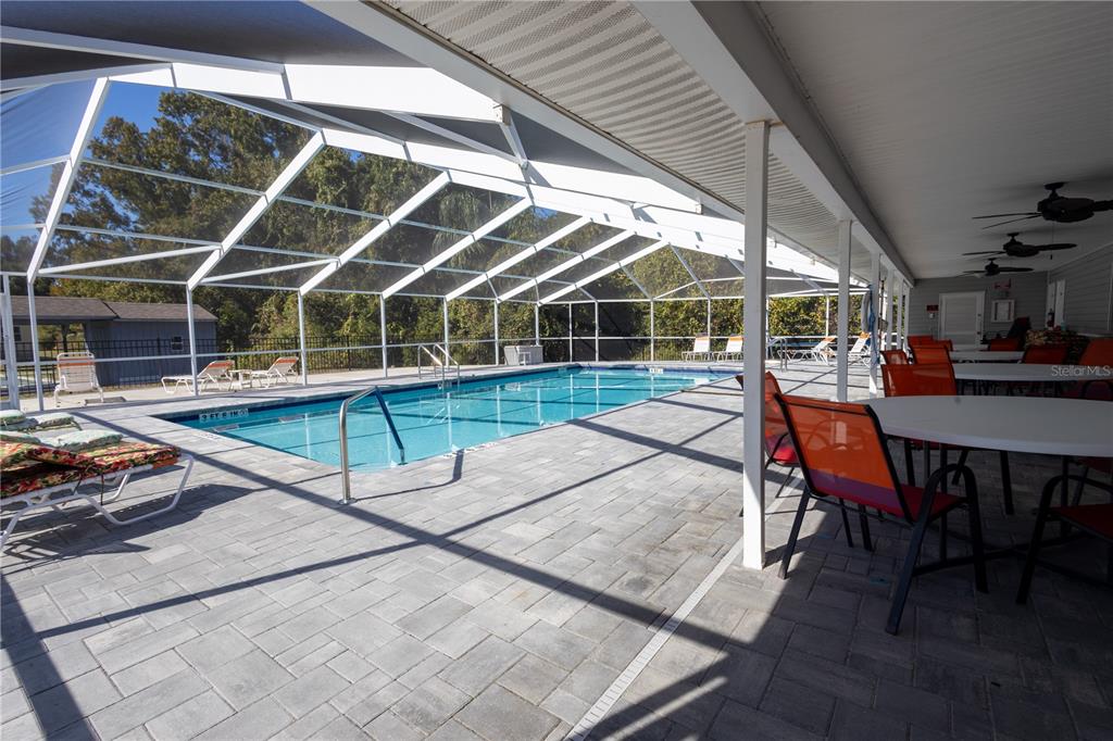 0 Forest Glenn Drive Spring Hill, FL 34607 - Photo 25 of 31 a patio with a table and chairs