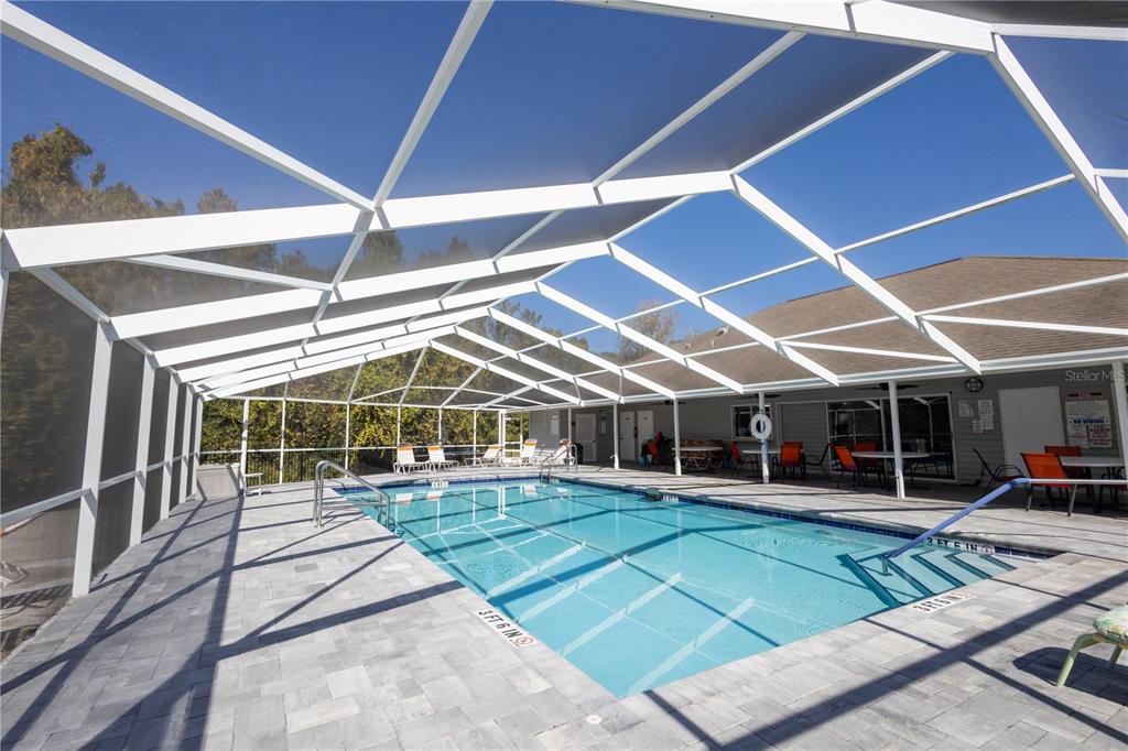 0 Forest Glenn Drive Spring Hill, FL 34607 - Photo 26 of 31 a view of a yard with table and chairs under an umbrella