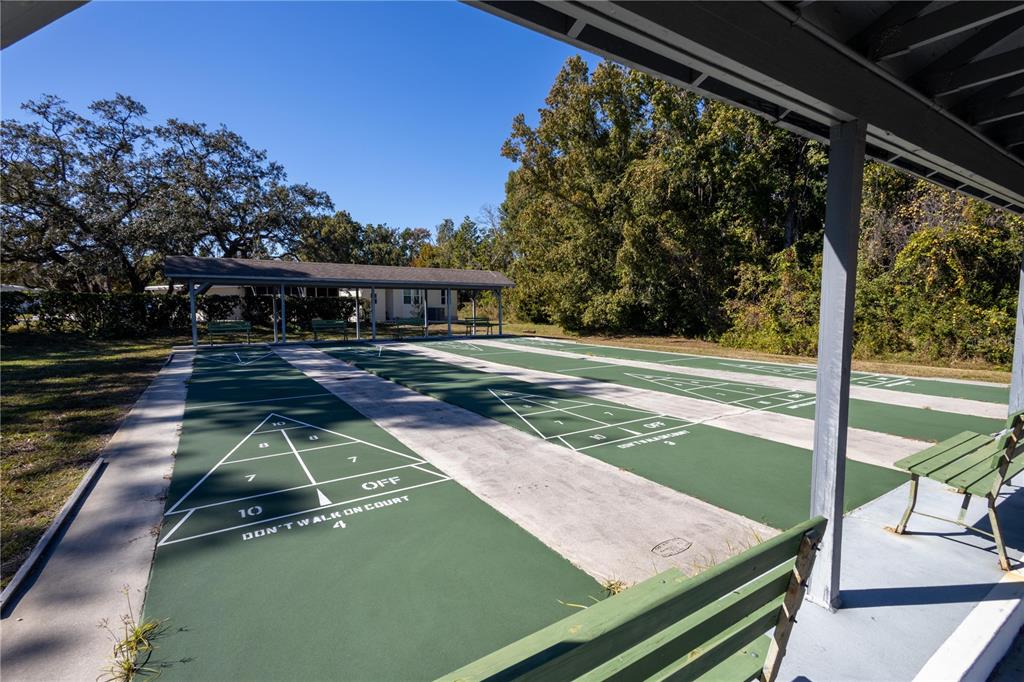 0 Forest Glenn Drive Spring Hill, FL 34607 - Photo 29 of 31 a view of a tennis ground with a large tree