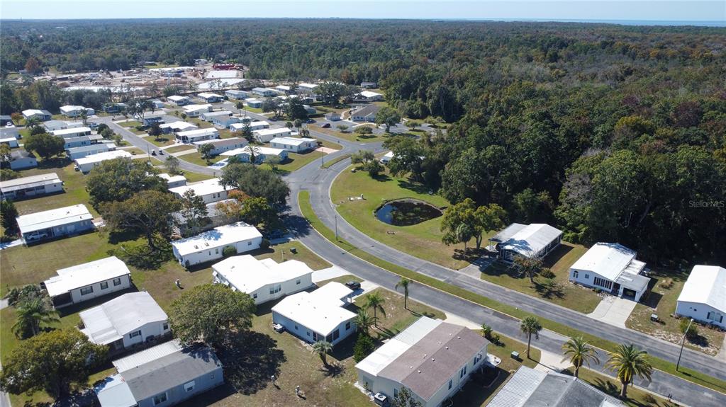 0 Forest Glenn Drive Spring Hill, FL 34607 - Photo 5 of 31 an aerial view of a house with a swimming pool