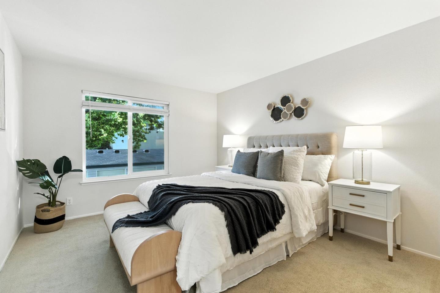 905 West Middlefield Road, Unit 974 Mountain View, CA 94043 - Photo 14 of 20 a bed room with a bed and a chair