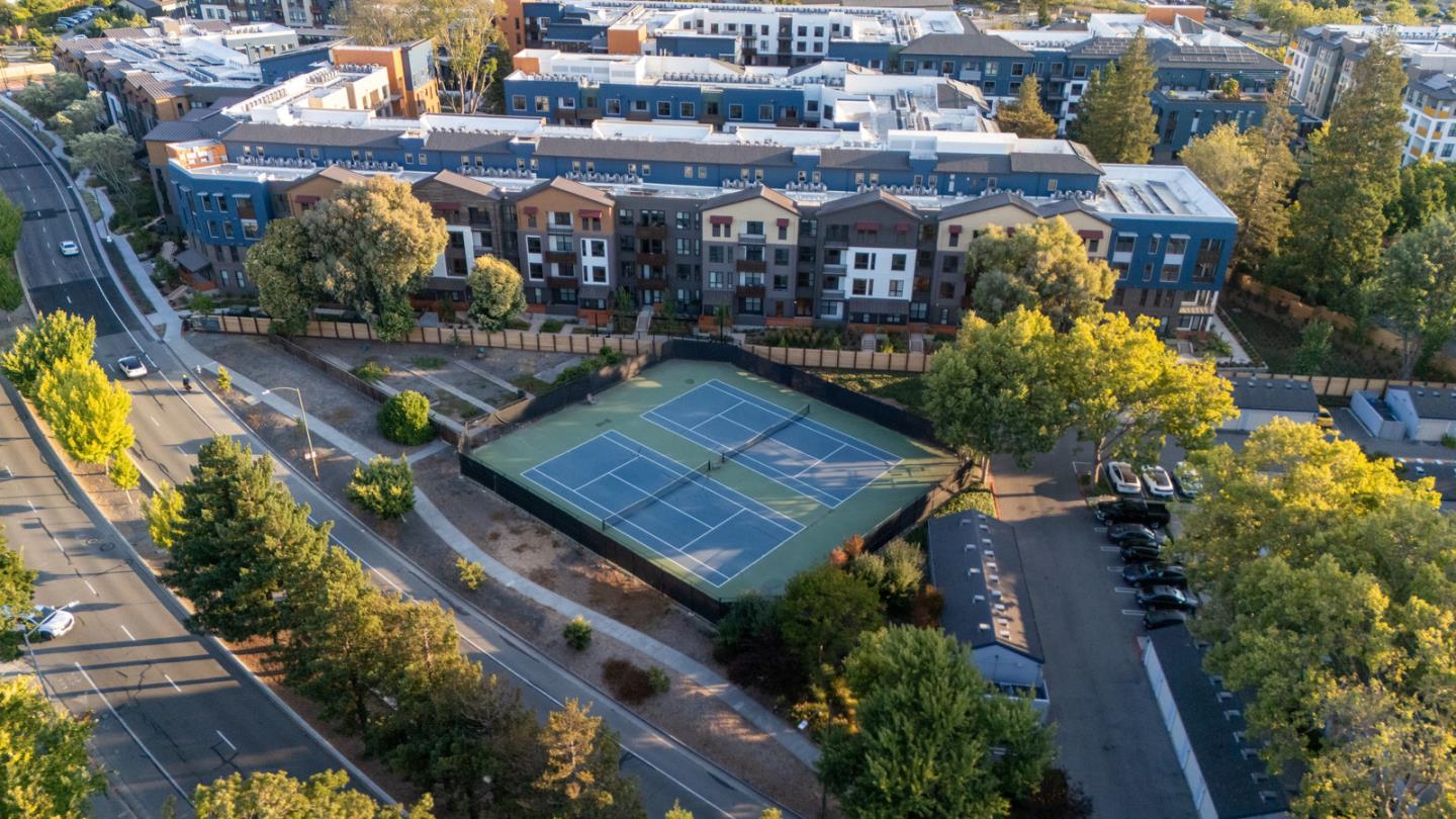 905 West Middlefield Road, Unit 974 Mountain View, CA 94043 - Photo 18 of 20 an aerial view of a house with a yard and potted plants