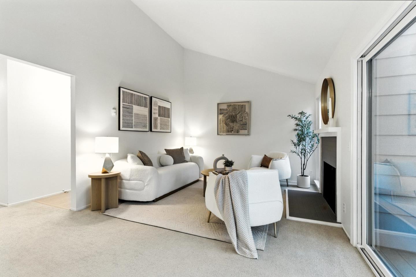905 West Middlefield Road, Unit 974 Mountain View, CA 94043 - Photo 6 of 20 a living room with furniture and a potted plant