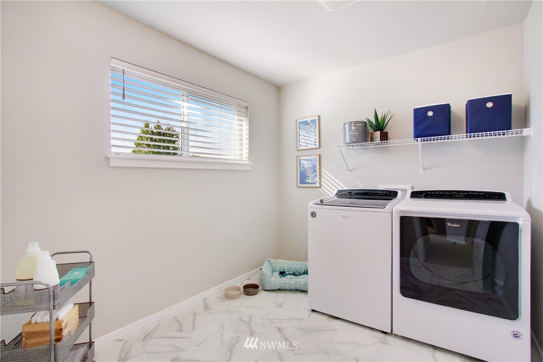 18631 Meridian Place West, Unit CC 10 Bothell, WA 98012 - Photo 24 of 27 a utility room with dryer and washer