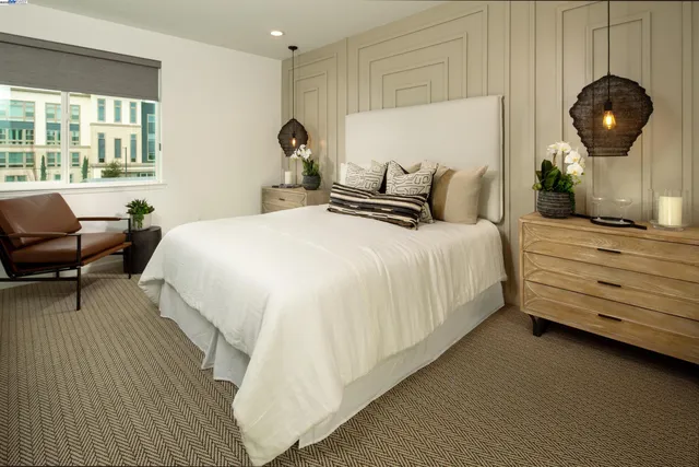 a bedroom with bed and a window