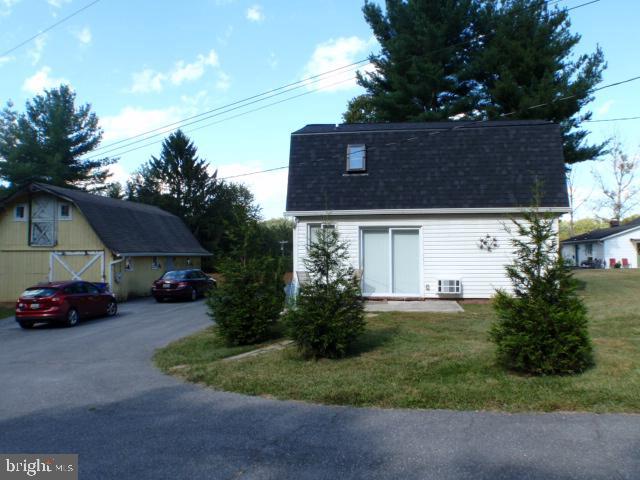 2022 Brown Road, Unit A Finksburg, MD 21048 - Photo 13 of 13 a car parked in front of a house