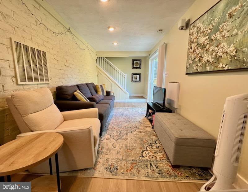 2022 Brown Road, Unit A Finksburg, MD 21048 - Photo 2 of 13 a living room with furniture and a couch