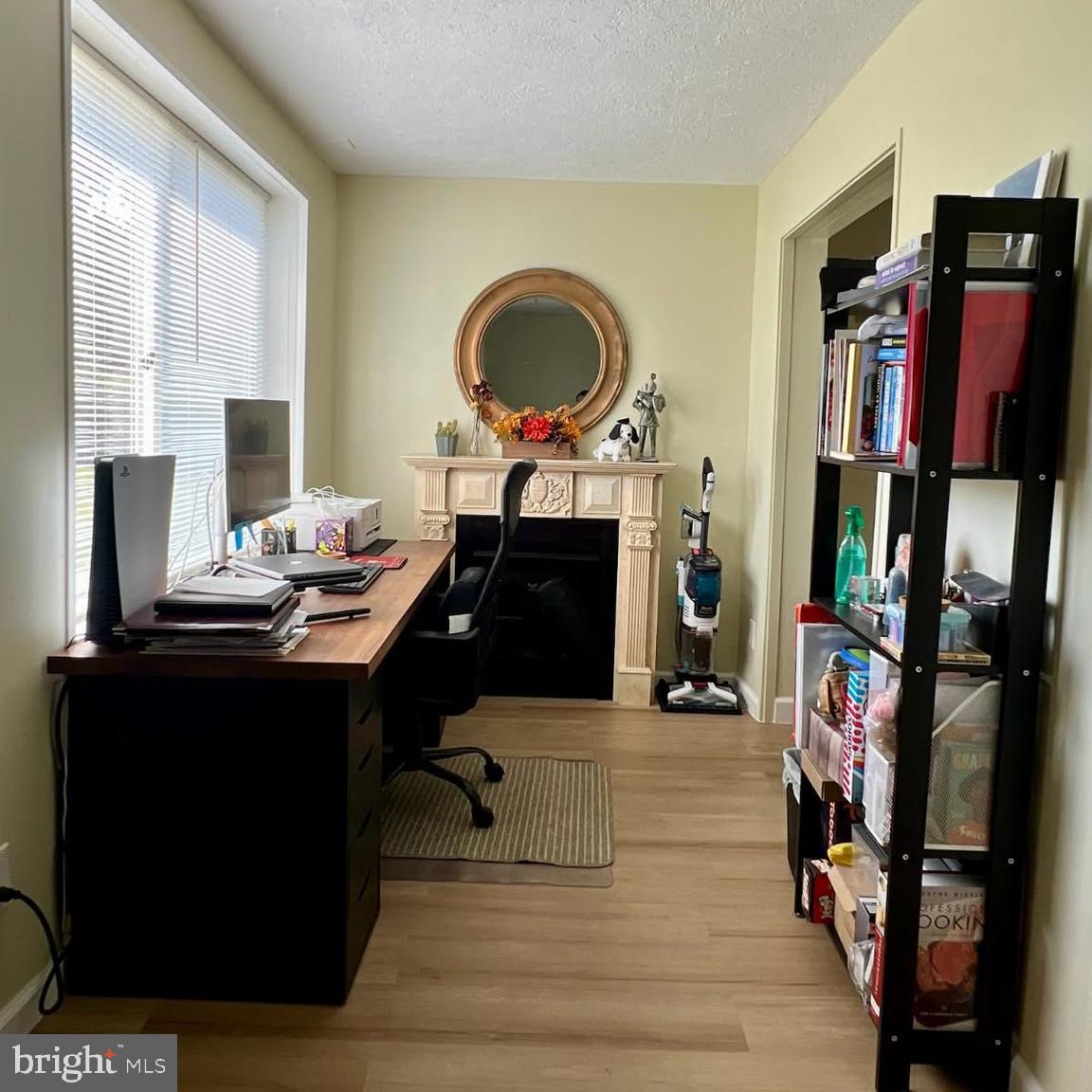 2022 Brown Road, Unit A Finksburg, MD 21048 - Photo 4 of 13 a room with furniture and a book shelf