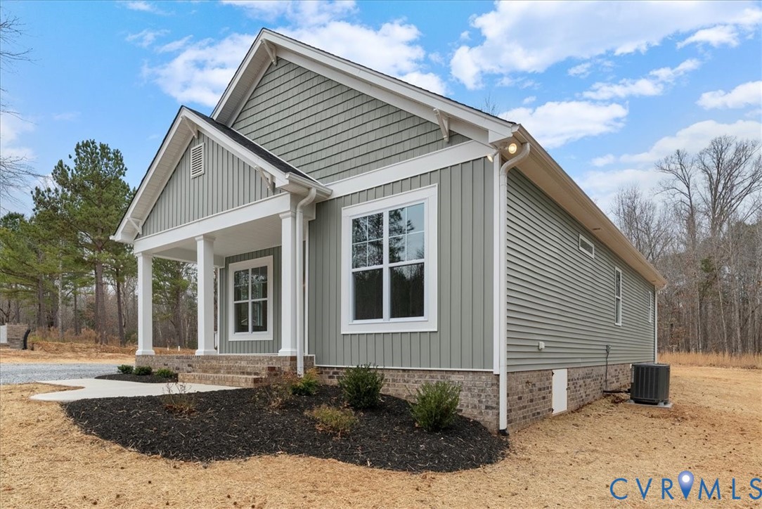 447 Raleigh Avenue South Hill, VA 23970 - Photo 6 of 31 a front view of a house with a yard