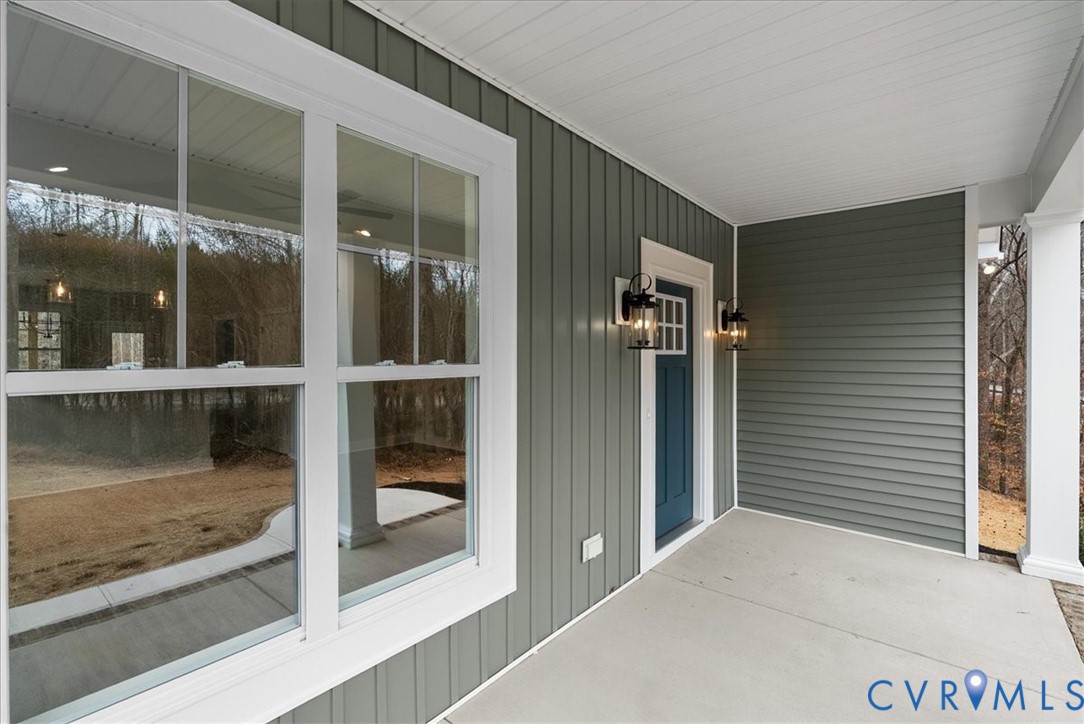 447 Raleigh Avenue South Hill, VA 23970 - Photo 8 of 31 a balcony with a glass door