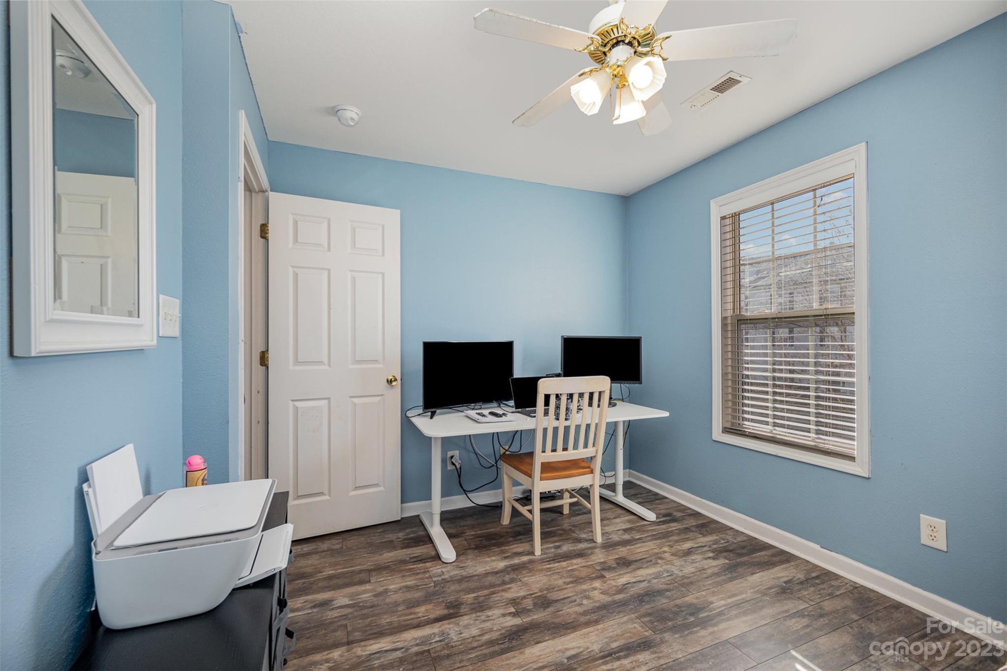 4006 Town Center Road Harrisburg, NC 28075 - Photo 14 of 19 a work room with furniture and a window