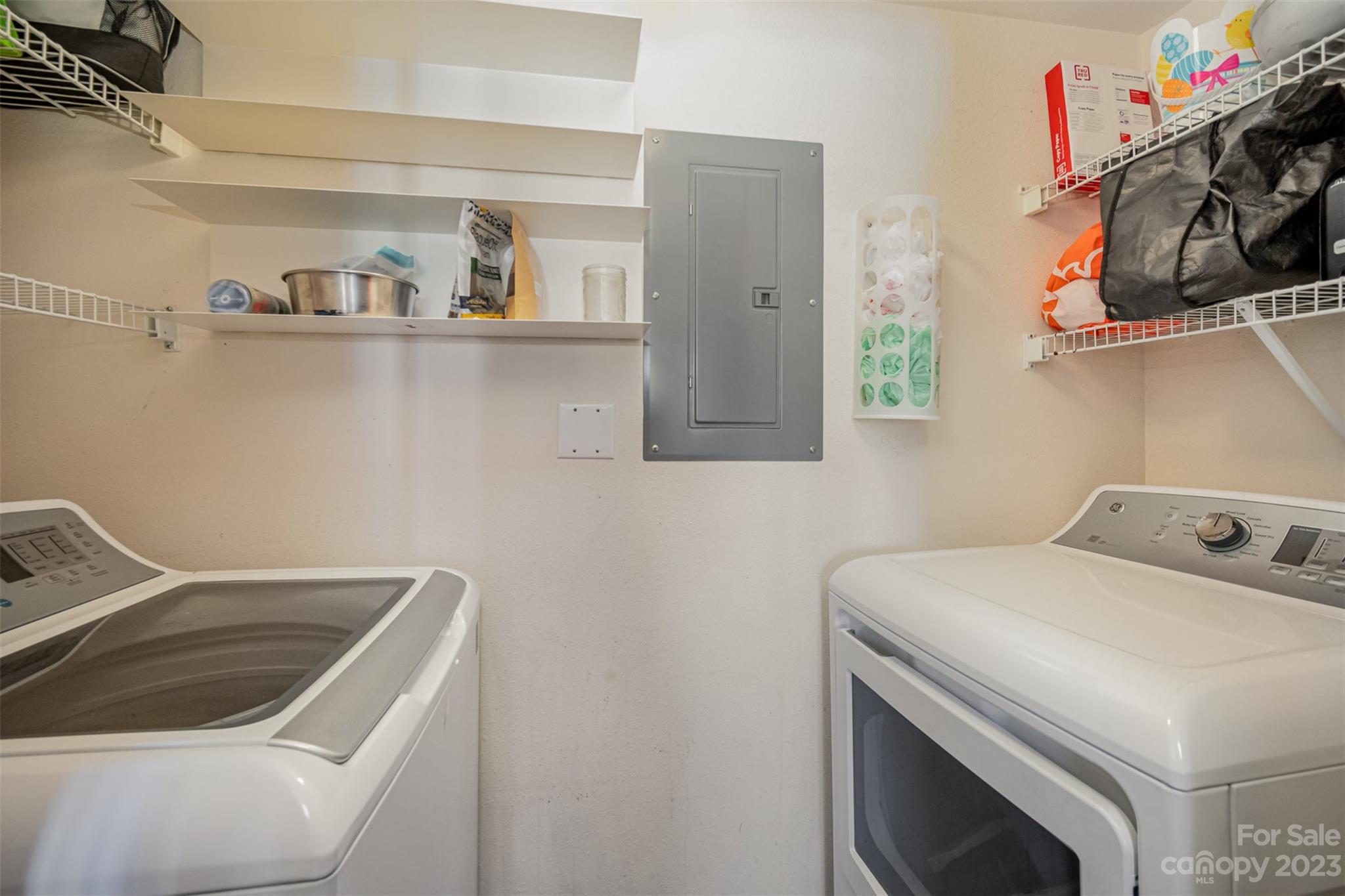 4006 Town Center Road Harrisburg, NC 28075 - Photo 17 of 19 a utility room with dryer and washer