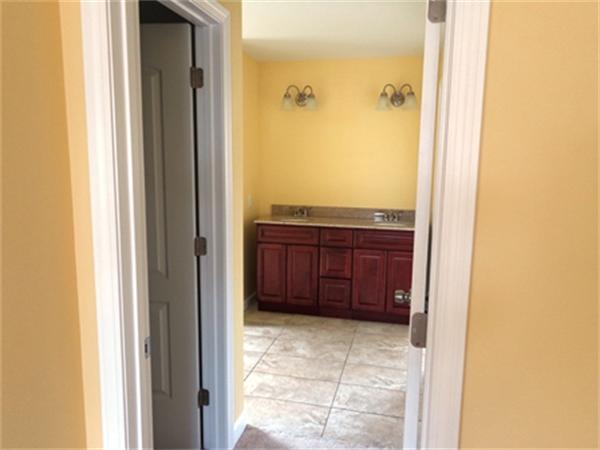 212 Mazarin Street Springfield, MA 01151 - Photo 11 of 22 a bathroom with a sink and a mirror