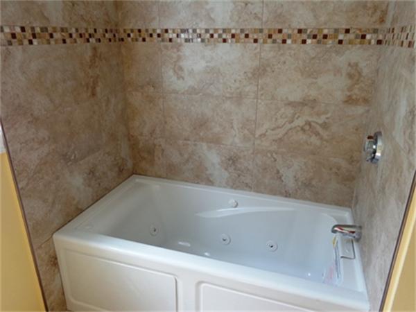 212 Mazarin Street Springfield, MA 01151 - Photo 15 of 22 a bathroom with a bathtub