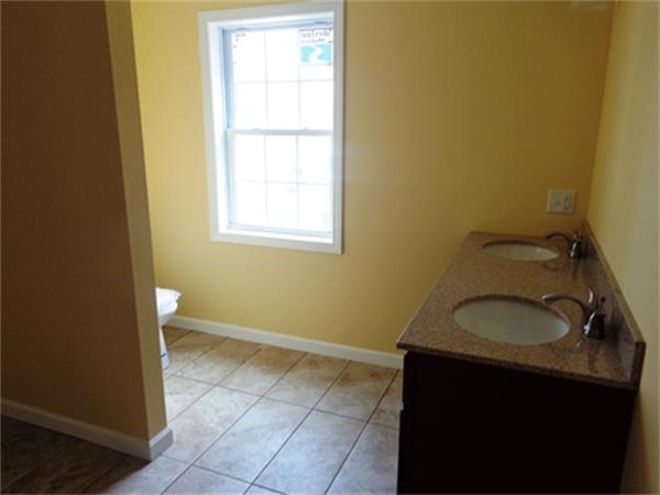 212 Mazarin Street Springfield, MA 01151 - Photo 17 of 22 a bathroom with a sink and a vanity