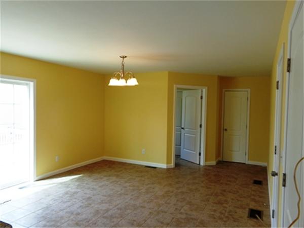 212 Mazarin Street Springfield, MA 01151 - Photo 4 of 22 a view of empty room with a fireplace