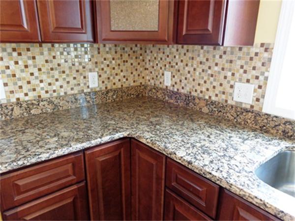 212 Mazarin Street Springfield, MA 01151 - Photo 9 of 22 a kitchen with a sink and cabinets