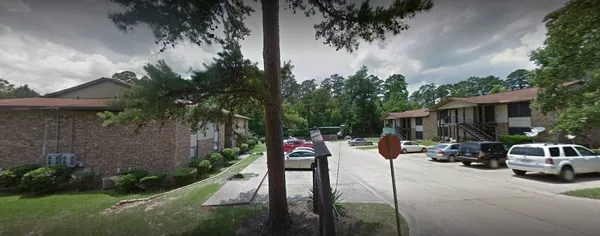 a view of a yard with patio