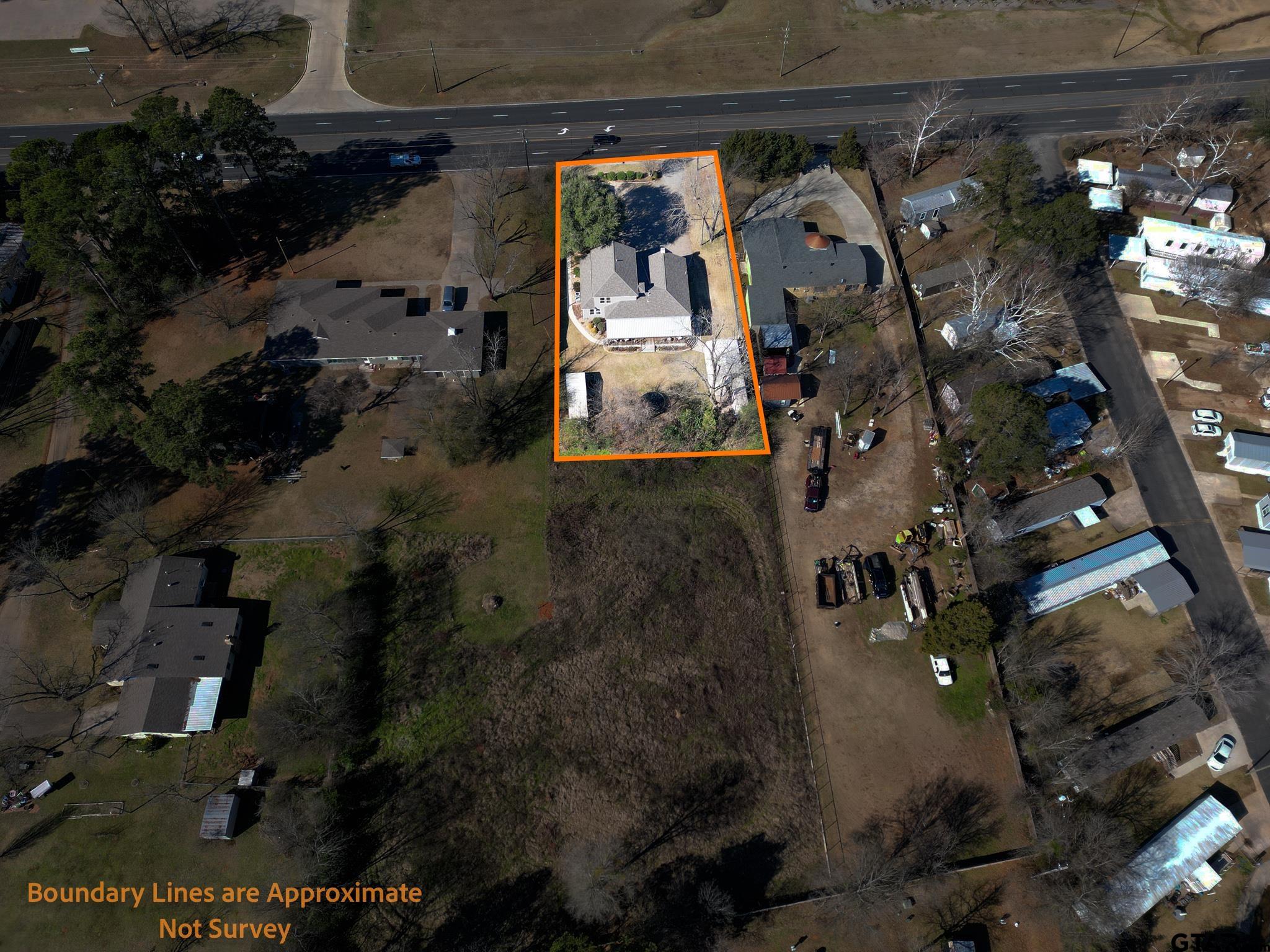 4538 West Loop 281 Longview, TX 75604 - Photo 12 of 45 an aerial view of residential house with outdoor space