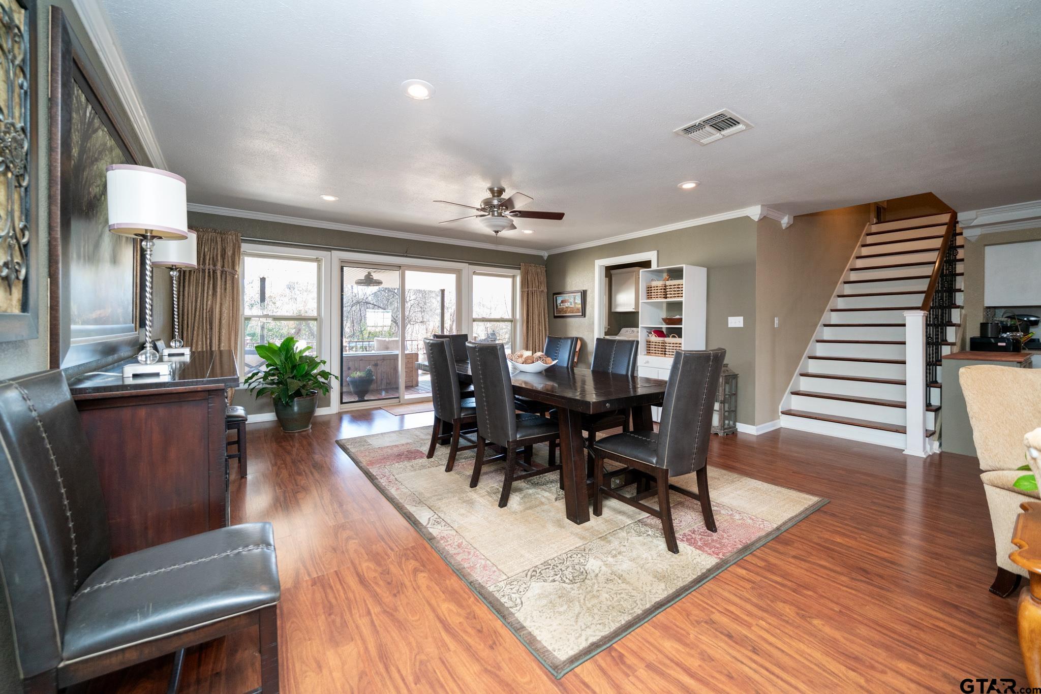 4538 West Loop 281 Longview, TX 75604 - Photo 26 of 45 a view of a dining room with furniture window and wooden floor