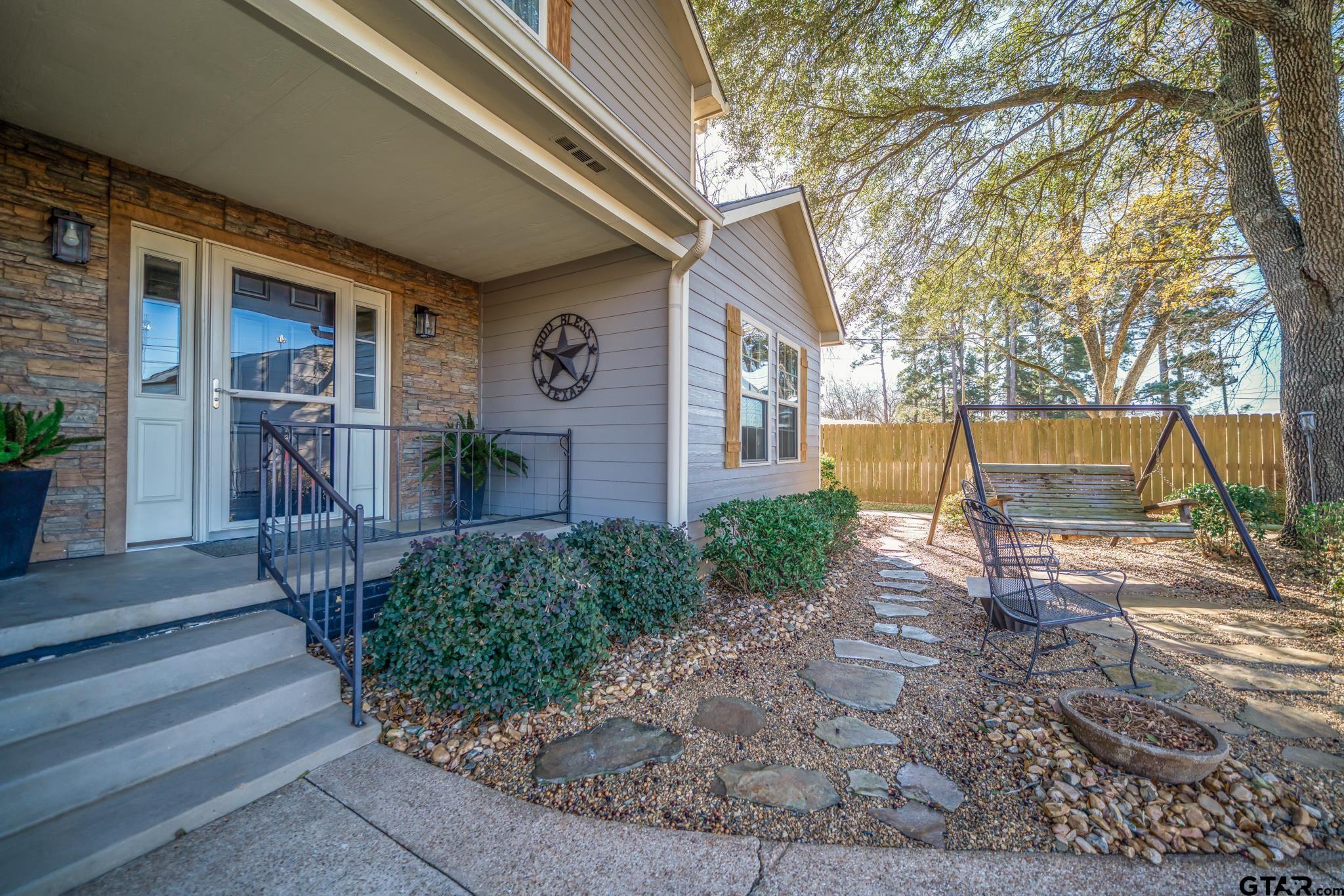 4538 West Loop 281 Longview, TX 75604 - Photo 4 of 45 a view of house with backyard and sitting area