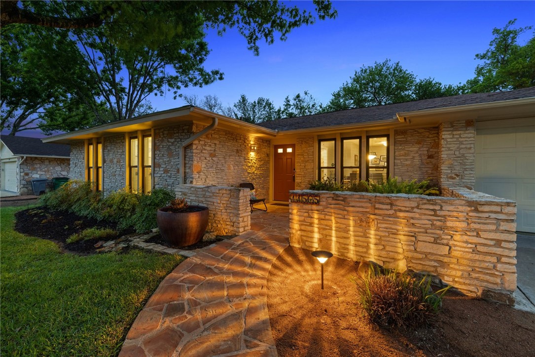 11505 Buckingham Road Austin, TX 78759 - Photo 1 of 1 a front view of a house with a yard