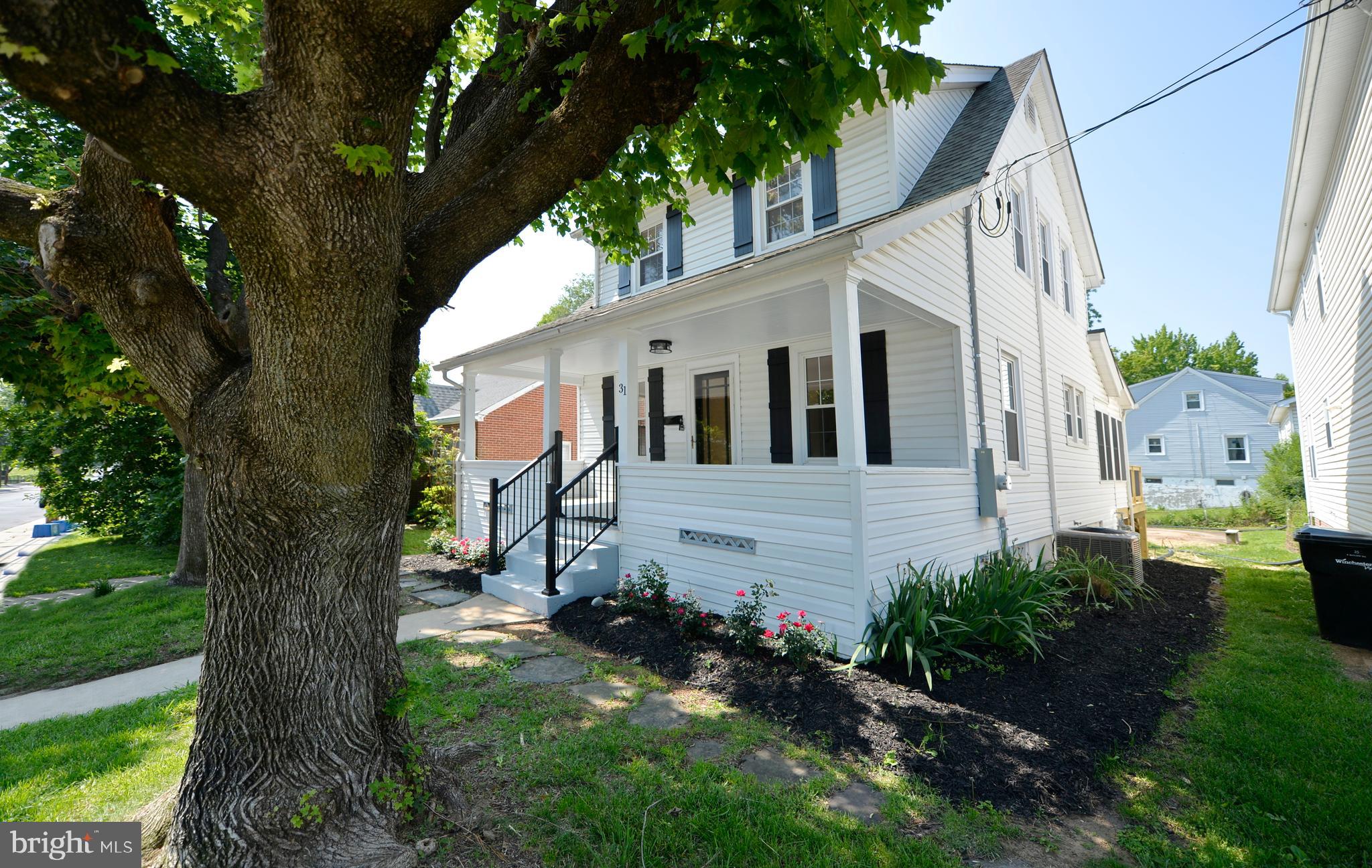 31 West Whitlock Avenue Winchester, VA 22601 - Photo 2 of 37 a view of a house with a yard