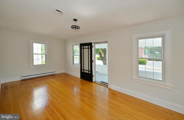 a view of a bathroom from the hallway
