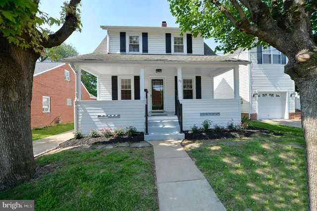 a view of a porch with a bench