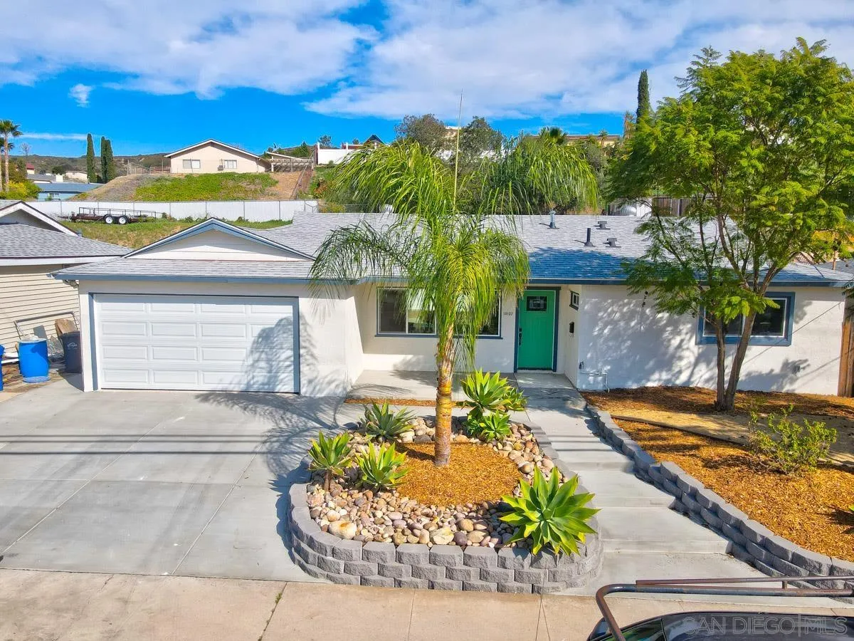 10137 Settle Road Santee, CA 92071 - Photo 8 of 8 a front view of a house with a yard