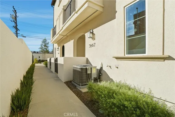 a view of a balcony with chairs