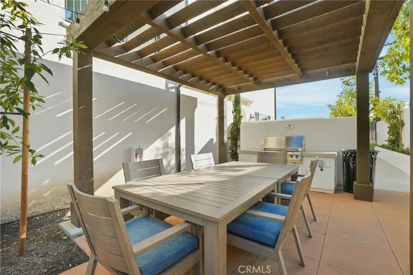 a view of an outdoor space with furniture