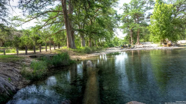 a view of a lake with outdoor space