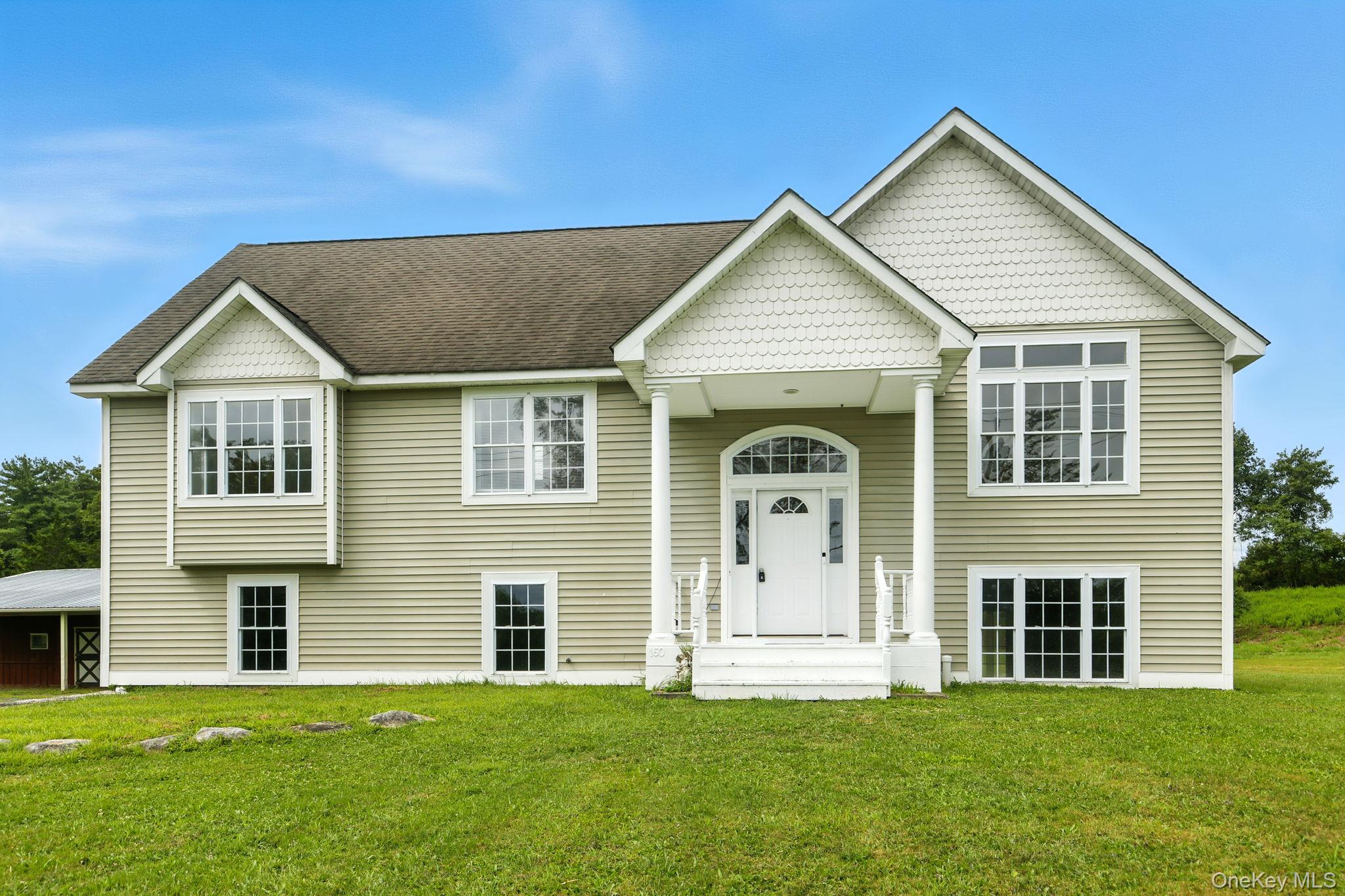 160 Pirog Road Pine Bush, NY 12566 - Photo 2 of 26 Raised ranch featuring a front lawn and roof with shingles