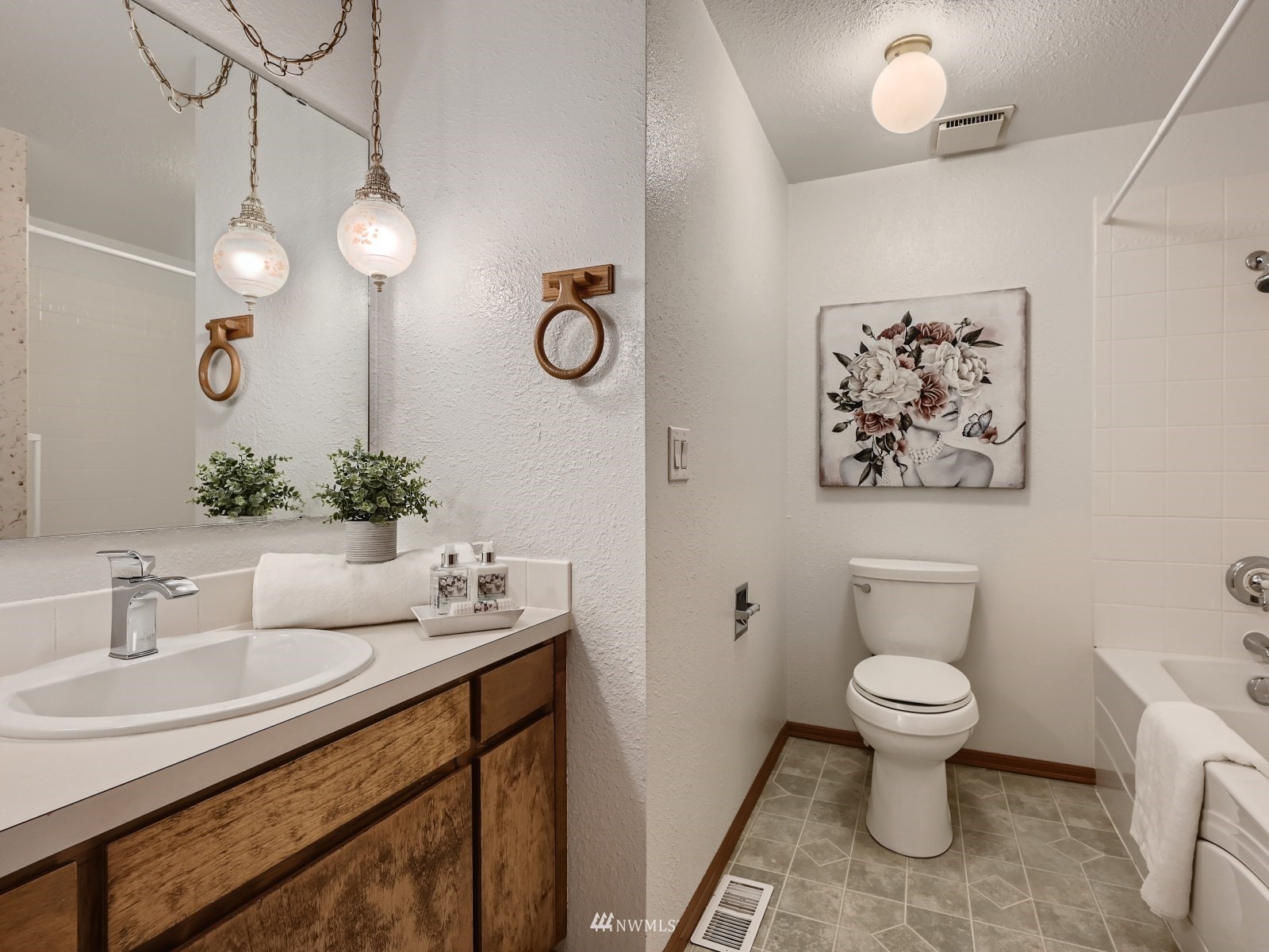 904 9th Street Snohomish, WA 98290 - Photo 17 of 40 a bathroom with a sink and a toilet