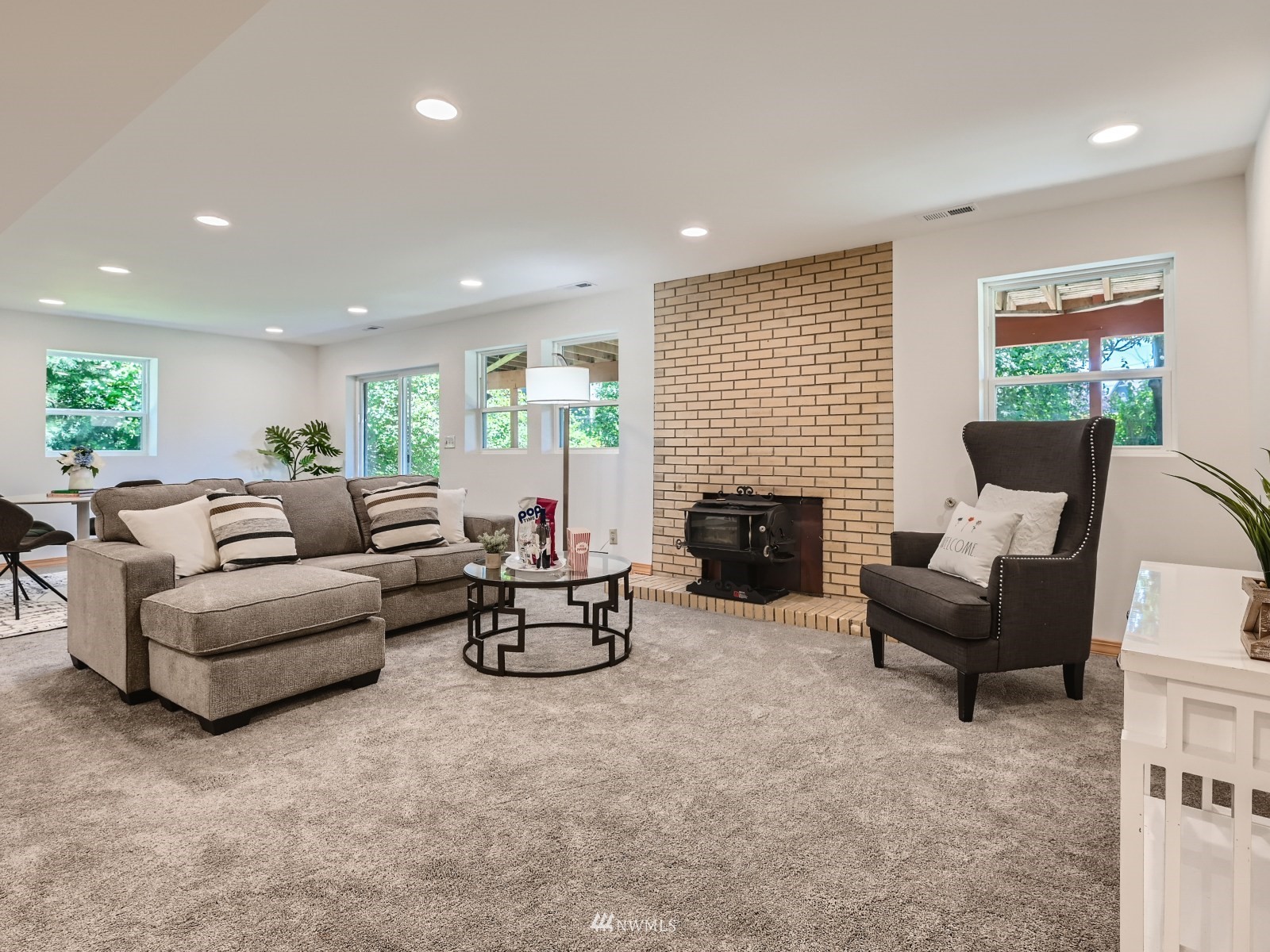904 9th Street Snohomish, WA 98290 - Photo 18 of 40 a living room with furniture and a fireplace