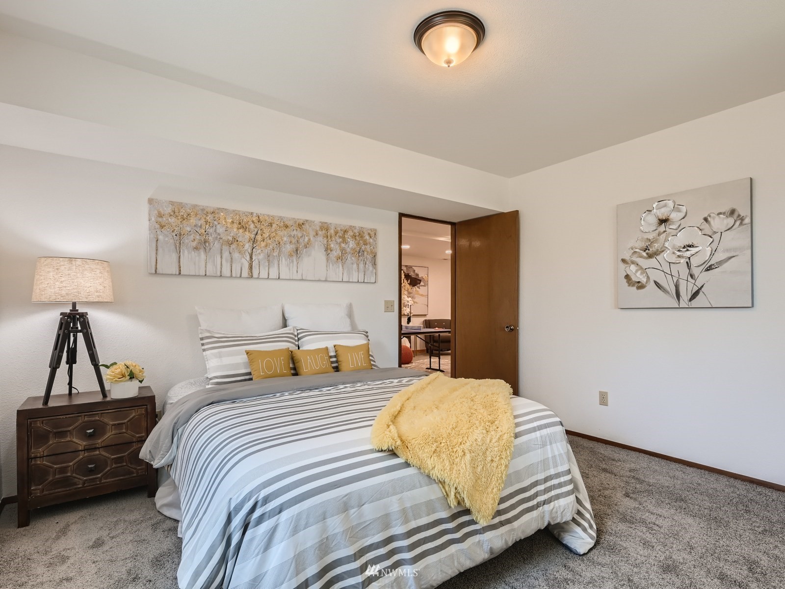 904 9th Street Snohomish, WA 98290 - Photo 21 of 40 a bedroom with double bed and a night stand