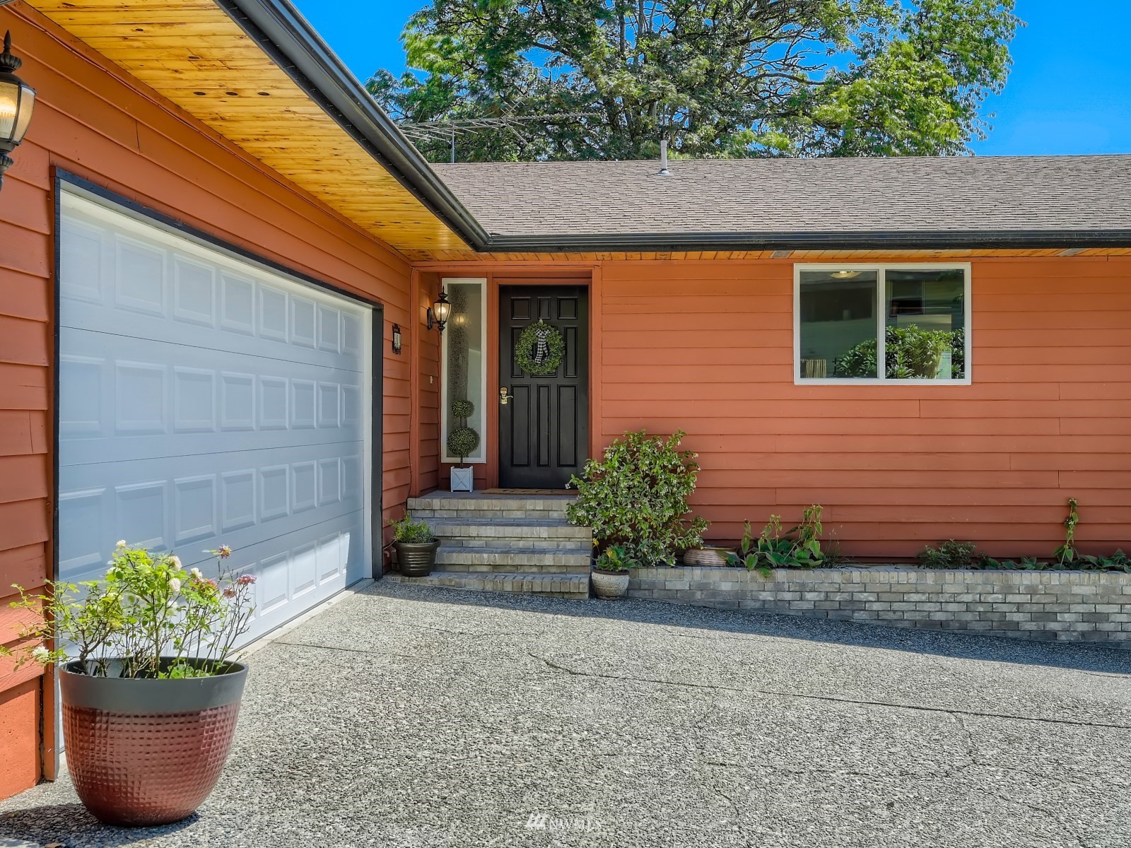 904 9th Street Snohomish, WA 98290 - Photo 3 of 40 a view of a house with potted plants