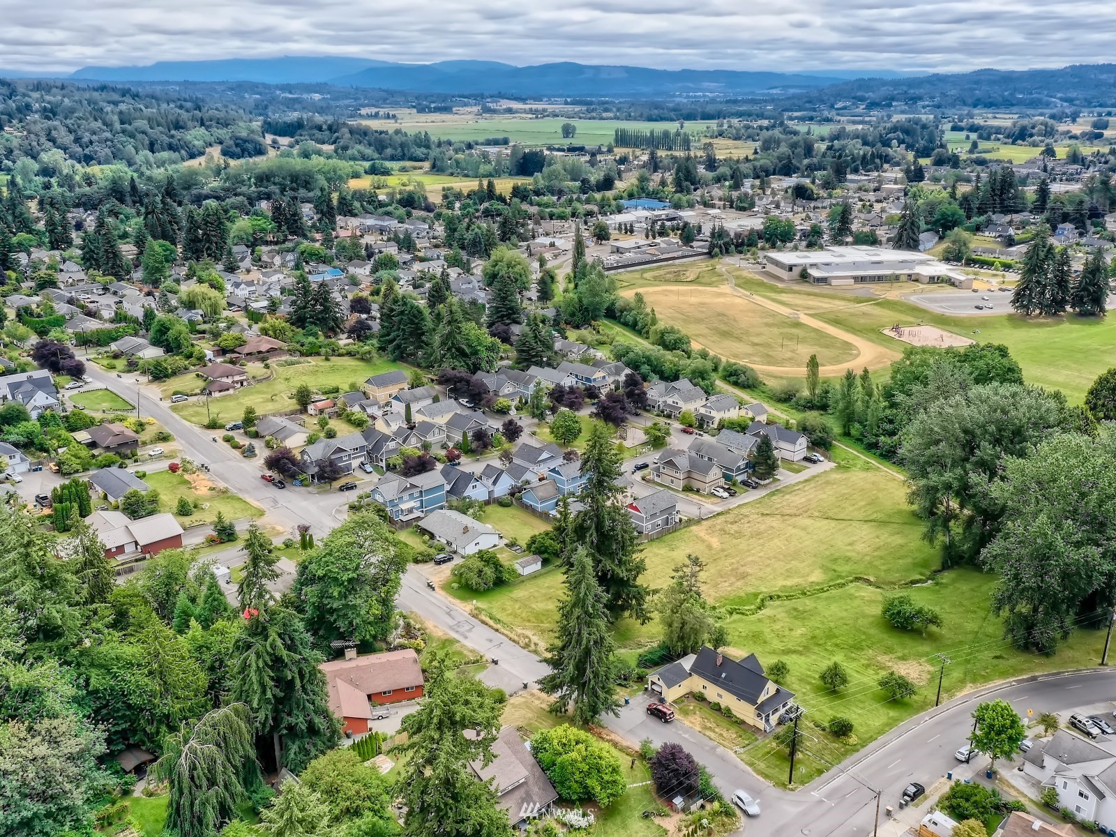 904 9th Street Snohomish, WA 98290 - Photo 40 of 40 an aerial view of residential houses with outdoor space and trees
