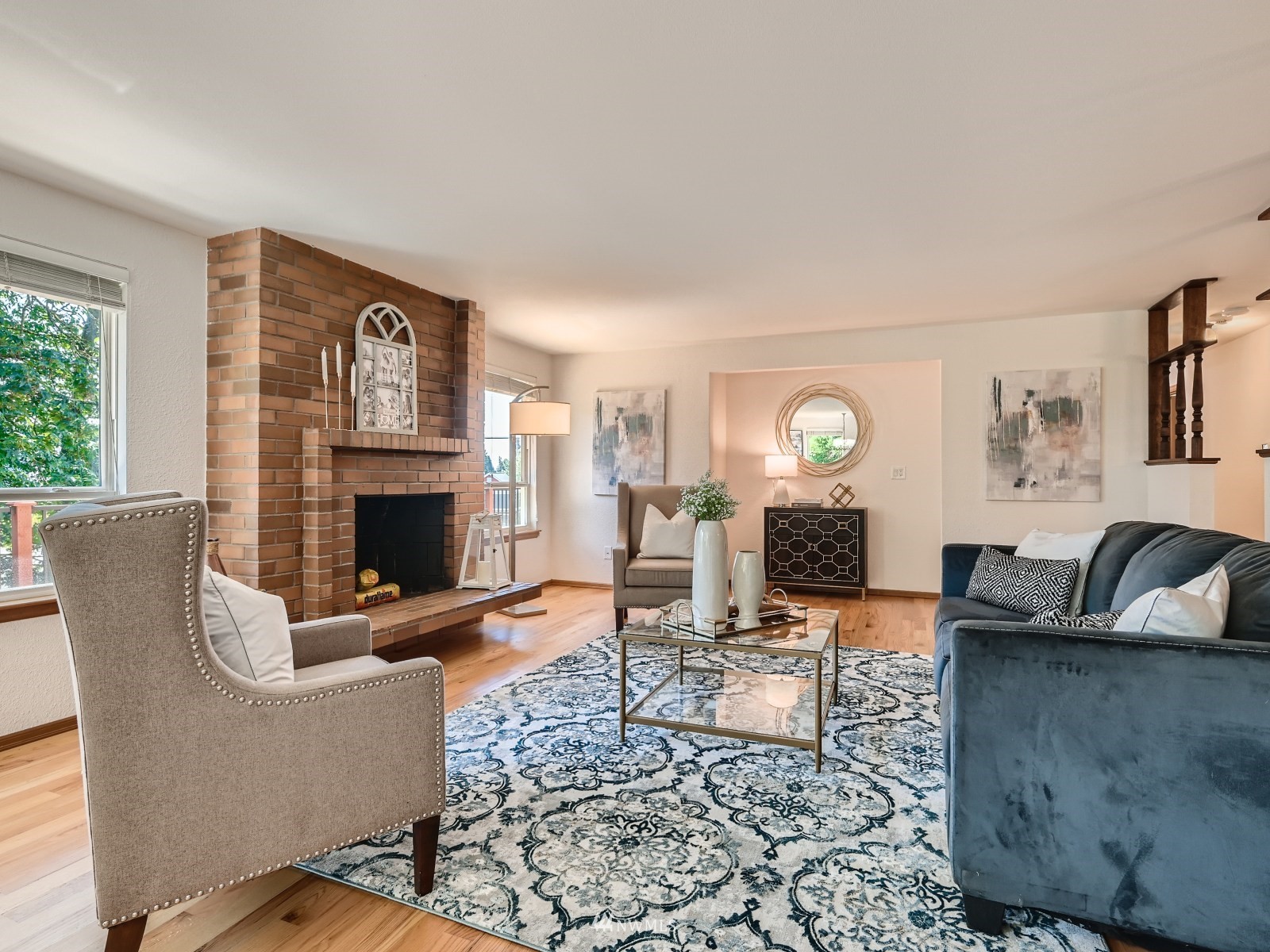 904 9th Street Snohomish, WA 98290 - Photo 5 of 40 a living room with furniture a fireplace a rug and a window