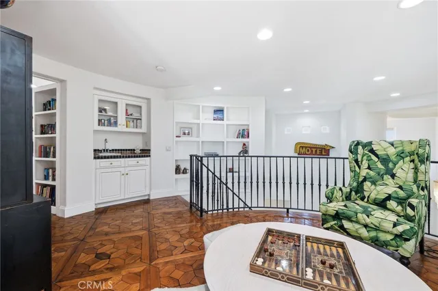 a view of a hallway with furniture