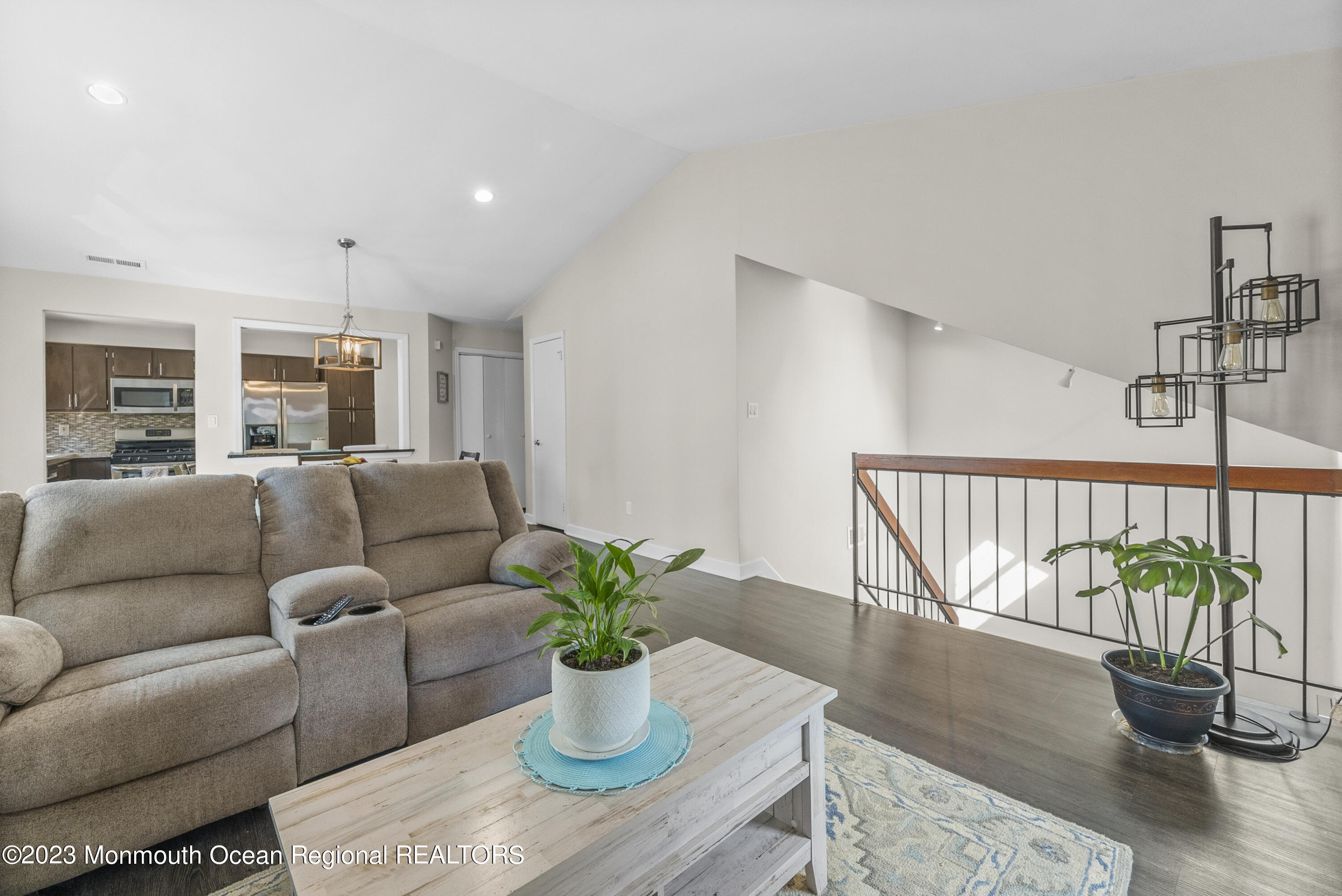 186 Tulip Lane Freehold, NJ 07728 - Photo 4 of 18 a living room with furniture potted plant and wooden floor